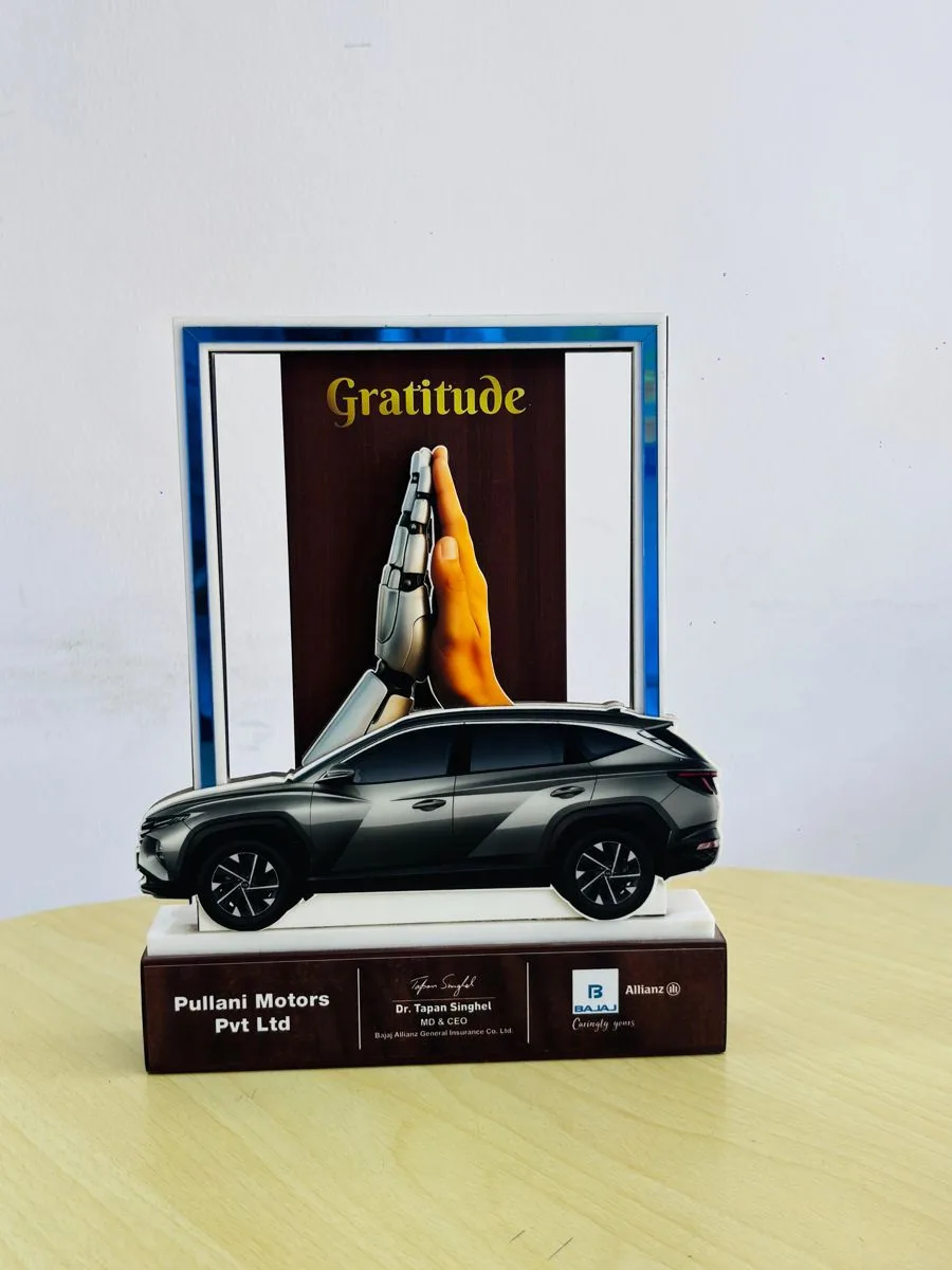 Bajaj Allianz — Gratitude Trophy by MD & CEO Dr. Tapan Singhel
